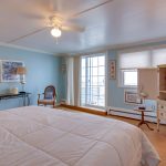 spacious oceana room with full size bed and balcony